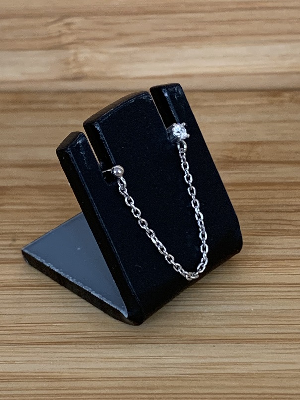 Boucle d'oreille unique pour 2 trous en argent et zircon