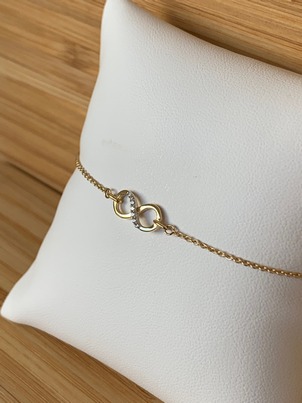 Bracelet Infini en or jaune 18ct avec zircons